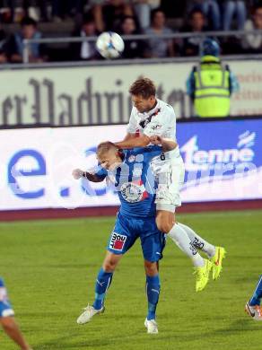 Fussball Bundesliga. RZ Pellets WAC gegen SC Wiener Neustadt. Boris Huettenbrenner,  (WAC), Matthias Koch (SC Wiener Neustadt). Wolfsberg, am 30.8.2014.
Foto: Kuess

---
pressefotos, pressefotografie, kuess, qs, qspictures, sport, bild, bilder, bilddatenbank