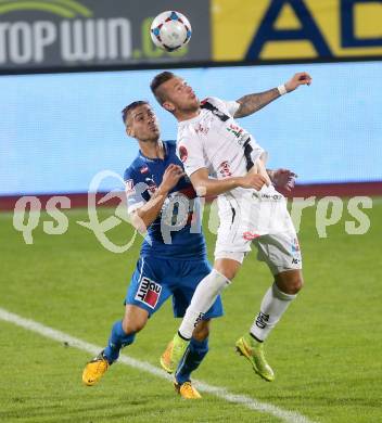 Fussball Bundesliga. RZ Pellets WAC gegen SC Wiener Neustadt. Peter Zulj,  (WAC), Remo Mally (SC Wiener Neustadt). Wolfsberg, am 30.8.2014.
Foto: Kuess

---
pressefotos, pressefotografie, kuess, qs, qspictures, sport, bild, bilder, bilddatenbank