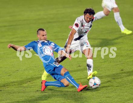 Fussball Bundesliga. RZ Pellets WAC gegen SC Wiener Neustadt. Nemanja Rnic,  (WAC), Julian Salamon (SC Wiener Neustadt). Wolfsberg, am 30.8.2014.
Foto: Kuess

---
pressefotos, pressefotografie, kuess, qs, qspictures, sport, bild, bilder, bilddatenbank