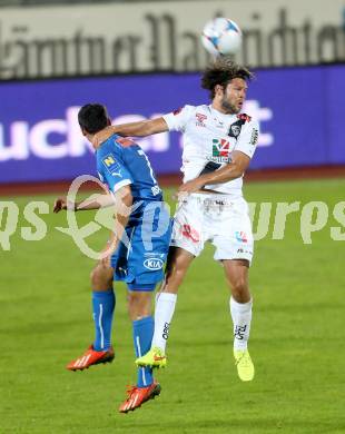 Fussball Bundesliga. RZ Pellets WAC gegen SC Wiener Neustadt. Nemanja Rnic,  (WAC), Osman Ali Abd Al Rahman (SC Wiener Neustadt). Wolfsberg, am 30.8.2014.
Foto: Kuess

---
pressefotos, pressefotografie, kuess, qs, qspictures, sport, bild, bilder, bilddatenbank