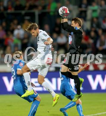 Fussball Bundesliga. RZ Pellets WAC gegen SC Wiener Neustadt. Boris Huettenbrenner,  (WAC), Thomas Vollnhofer (SC Wiener Neustadt). Wolfsberg, am 30.8.2014.
Foto: Kuess

---
pressefotos, pressefotografie, kuess, qs, qspictures, sport, bild, bilder, bilddatenbank