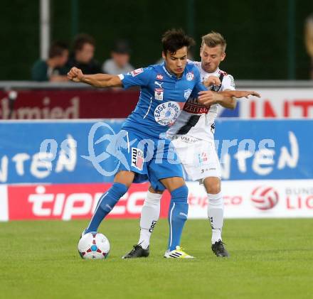 Fussball Bundesliga. RZ Pellets WAC gegen SC Wiener Neustadt. Manuel Kerhe, (WAC), Kristijan Dobras  (SC Wiener Neustadt). Wolfsberg, am 30.8.2014.
Foto: Kuess

---
pressefotos, pressefotografie, kuess, qs, qspictures, sport, bild, bilder, bilddatenbank