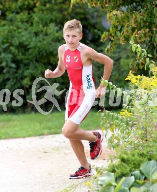 Woerthersee Triathlon.  Rene Hilber. Krumpendorf, am 31.8.2014.
Foto: Kuess
---
pressefotos, pressefotografie, kuess, qs, qspictures, sport, bild, bilder, bilddatenbank