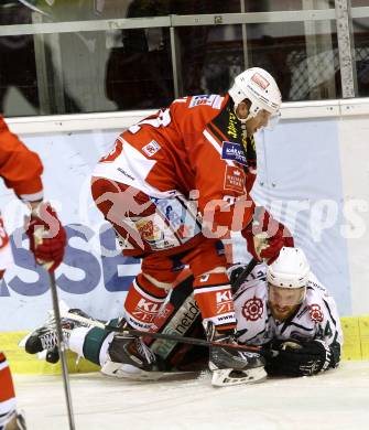 EBEL. Eishockey Bundesliga. KAC gegen Starbulls Rosenheim. Thomas Poeck,  (KAC),  Tyler McNeely (Rosenheim). Klagenfurt, am 31.8.2014.
Foto: Kuess 

---
pressefotos, pressefotografie, kuess, qs, qspictures, sport, bild, bilder, bilddatenbank