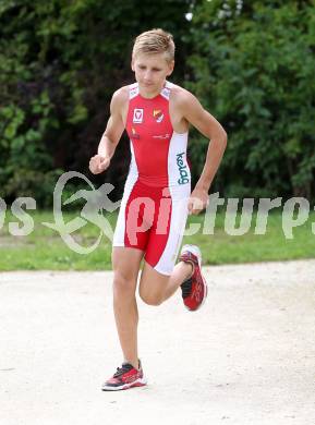 Woerthersee Triathlon. Rene Hilber. Krumpendorf, am 31.8.2014.
Foto: Kuess
---
pressefotos, pressefotografie, kuess, qs, qspictures, sport, bild, bilder, bilddatenbank