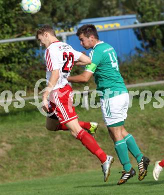 Fussball Unterliga Ost. Ludmannsdorf gegen Mittlern. Michael Krainer, (Ludmannsdorf), Patrick Hober (Mittlern). Ludmannsdorf, am 31.8.2014. 
Foto: Kuess
---
pressefotos, pressefotografie, kuess, qs, qspictures, sport, bild, bilder, bilddatenbank