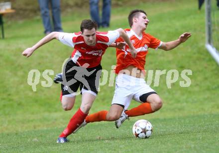 Fussball 1. KLasse C1.  Sirnitz gegen Eberstein. Gregor Gwenger,  (Sirnitz), Thomas Rabitsch (Eberstein). Sirnitz, am 30.8.2014.
Foto: Kuess
---
pressefotos, pressefotografie, kuess, qs, qspictures, sport, bild, bilder, bilddatenbank