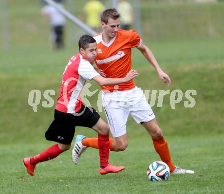 Fussball 1. KLasse C1.  Sirnitz gegen Eberstein. Kevin Alfons Bretis, (Sirnitz), Manuel Rabitsch (Eberstein). Sirnitz, am 30.8.2014.
Foto: Kuess
---
pressefotos, pressefotografie, kuess, qs, qspictures, sport, bild, bilder, bilddatenbank