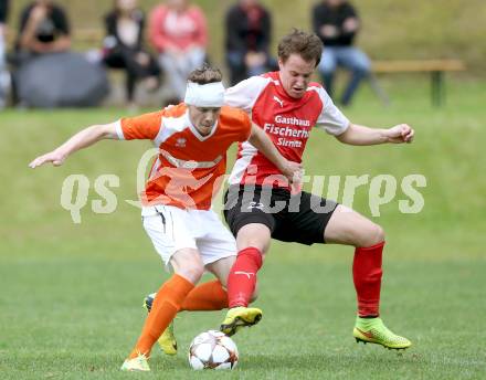 Fussball 1. KLasse C1.  Sirnitz gegen Eberstein. Marco Huber,  (Sirnitz), Milan Radonjic (Eberstein). Sirnitz, am 30.8.2014.
Foto: Kuess
---
pressefotos, pressefotografie, kuess, qs, qspictures, sport, bild, bilder, bilddatenbank