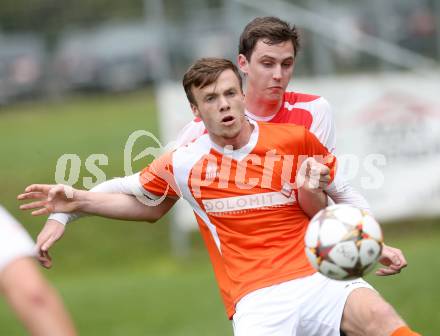 Fussball 1. KLasse C1.  Sirnitz gegen Eberstein. Gregor Gwenger, (Sirnitz), Aleksandar Radonjic  (Eberstein). Sirnitz, am 30.8.2014.
Foto: Kuess
---
pressefotos, pressefotografie, kuess, qs, qspictures, sport, bild, bilder, bilddatenbank