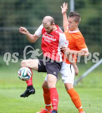 Fussball 1. KLasse C1.  Sirnitz gegen Eberstein. Markus Struckl, (Sirnitz), Tim Kasalovic  (Eberstein). Sirnitz, am 30.8.2014.
Foto: Kuess
---
pressefotos, pressefotografie, kuess, qs, qspictures, sport, bild, bilder, bilddatenbank