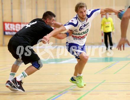 Handball Bundesliga. SC Ferlach gegen HSG Holding Graz. Miha Tomsic,  (Ferlach), Alen Melnjak (Graz). Ferlach, 6.9.2014.
Foto: Kuess
---
pressefotos, pressefotografie, kuess, qs, qspictures, sport, bild, bilder, bilddatenbank