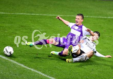 Fussball Regionalliga. SK Austria Klagenfurt gegen SC Sparkasse Weiz. Vedran Vinko, (Klagenfurt), Stefan Goelles (Weiz). Klagenfurt, 12.9.2014.
Foto: Kuess
---
pressefotos, pressefotografie, kuess, qs, qspictures, sport, bild, bilder, bilddatenbank