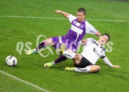 Fussball Regionalliga. SK Austria Klagenfurt gegen SC Sparkasse Weiz. Vedran Vinko, (Klagenfurt), Stefan Goelles (Weiz). Klagenfurt, 12.9.2014.
Foto: Kuess
---
pressefotos, pressefotografie, kuess, qs, qspictures, sport, bild, bilder, bilddatenbank