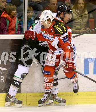 EBEL. Eishockey Bundesliga. KAC gegen HDD TELEMACH Olimpija Ljubljana.  Jamie Lundmark, (KAC),  Kyle Medvec (Laibach). Klagenfurt, am 12.9.2014.
Foto: Kuess 

---
pressefotos, pressefotografie, kuess, qs, qspictures, sport, bild, bilder, bilddatenbank