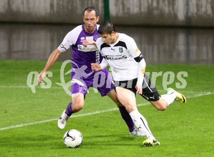 Fussball Regionalliga. SK Austria Klagenfurt gegen SC Sparkasse Weiz. Christian Prawda, (Klagenfurt), Stefan Goelles (Weiz). Klagenfurt, 12.9.2014.
Foto: Kuess
---
pressefotos, pressefotografie, kuess, qs, qspictures, sport, bild, bilder, bilddatenbank