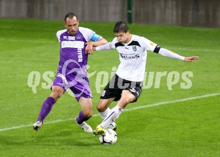 Fussball Regionalliga. SK Austria Klagenfurt gegen SC Sparkasse Weiz. Christian Prawda, (Klagenfurt), Stefan Goelles (Weiz). Klagenfurt, 12.9.2014.
Foto: Kuess
---
pressefotos, pressefotografie, kuess, qs, qspictures, sport, bild, bilder, bilddatenbank