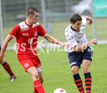 Fussball. Unterliga Ost. KAC 1909 gegen SPG FC Poggersdorf KM. Bernhard Karre (KAC), Fabian Krenn (Poggersdorf). Klagenfurt, 13.9.2014.
Foto: Kuess
---
pressefotos, pressefotografie, kuess, qs, qspictures, sport, bild, bilder, bilddatenbank