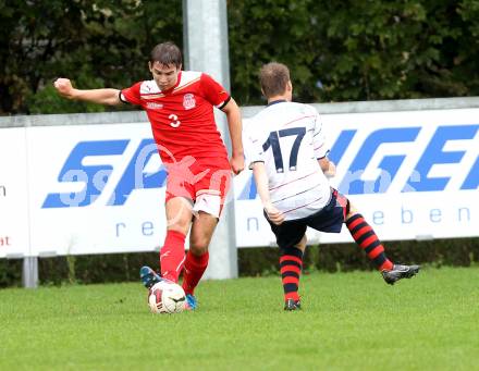 Fussball. Unterliga Ost. KAC 1909 gegen SPG FC Poggersdorf KM. Martin Auer (KAC), Gerhard Krumpl (Poggersdorf). Klagenfurt, 13.9.2014.
Foto: Kuess
---
pressefotos, pressefotografie, kuess, qs, qspictures, sport, bild, bilder, bilddatenbank