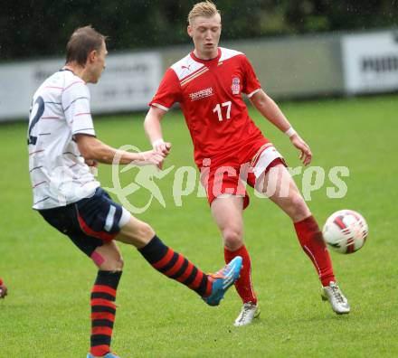 Fussball. Unterliga Ost. KAC 1909 gegen SPG FC Poggersdorf KM. Andreas Walcher (KAC), Ziga Bokal (Poggersdorf). Klagenfurt, 13.9.2014.
Foto: Kuess
---
pressefotos, pressefotografie, kuess, qs, qspictures, sport, bild, bilder, bilddatenbank