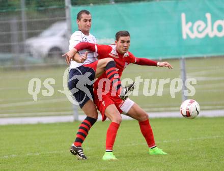 Fussball. Unterliga Ost. KAC 1909 gegen SPG FC Poggersdorf KM. Toni Krijan (KAC), Blaz Brezovacki (Poggersdorf). Klagenfurt, 13.9.2014.
Foto: Kuess
---
pressefotos, pressefotografie, kuess, qs, qspictures, sport, bild, bilder, bilddatenbank