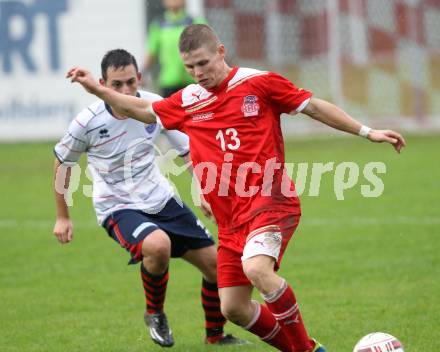 Fussball. Unterliga Ost. KAC 1909 gegen SPG FC Poggersdorf KM. Matic Petek (KAC), Christoph Duller (Poggersdorf). Klagenfurt, 13.9.2014.
Foto: Kuess
---
pressefotos, pressefotografie, kuess, qs, qspictures, sport, bild, bilder, bilddatenbank