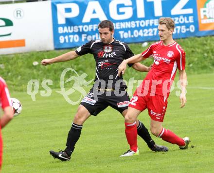 Fussball. Unterliga Ost. Ludmannsdorf gegen Kraig. Michael Krainer (Ludmannsdorf), Gernot Fasching (Kraig).
Ludmannsdorf, 14.9.2014.
Foto: Kuess
---
pressefotos, pressefotografie, kuess, qs, qspictures, sport, bild, bilder, bilddatenbank