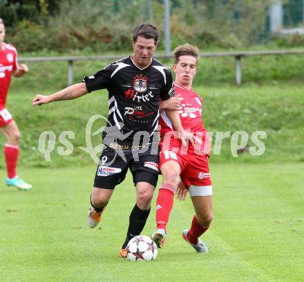 Fussball. Unterliga Ost. Ludmannsdorf gegen Kraig. Markus Partl (Ludmannsdorf), Harald Stark (Kraig).
Ludmannsdorf, 14.9.2014.
Foto: Kuess
---
pressefotos, pressefotografie, kuess, qs, qspictures, sport, bild, bilder, bilddatenbank