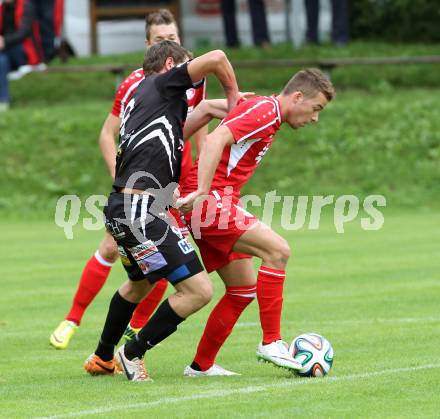 Fussball. Unterliga Ost. Ludmannsdorf gegen Kraig. Marcel Quantschnig (Ludmannsdorf), Harald Stark (Kraig).
Ludmannsdorf, 14.9.2014.
Foto: Kuess
---
pressefotos, pressefotografie, kuess, qs, qspictures, sport, bild, bilder, bilddatenbank