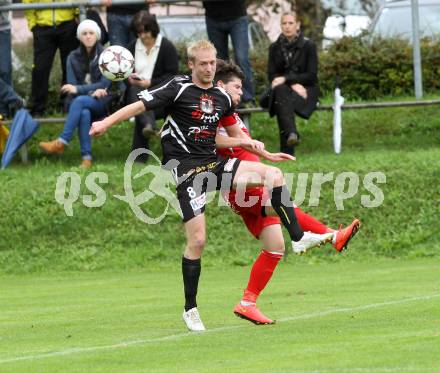 Fussball. Unterliga Ost. Ludmannsdorf gegen Kraig. Andreas Schawarz (Ludmannsdorf), Raphael Groinig (Kraig).
Ludmannsdorf, 14.9.2014.
Foto: Kuess
---
pressefotos, pressefotografie, kuess, qs, qspictures, sport, bild, bilder, bilddatenbank