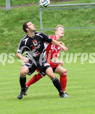 Fussball. Unterliga Ost. Ludmannsdorf gegen Kraig. Michael Krainer (Ludmannsdorf), Gernot Fasching (Kraig).
Ludmannsdorf, 14.9.2014.
Foto: Kuess
---
pressefotos, pressefotografie, kuess, qs, qspictures, sport, bild, bilder, bilddatenbank