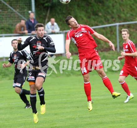 Fussball. Unterliga Ost. Ludmannsdorf gegen Kraig. Patrick Quantschnig (Ludmannsdorf), Stefan Wildhaber (Kraig).
Ludmannsdorf, 14.9.2014.
Foto: Kuess
---
pressefotos, pressefotografie, kuess, qs, qspictures, sport, bild, bilder, bilddatenbank