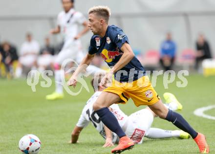 Fussball Bundesliga. RZ Pellets WAC gegen FC Red Bull Salzburg. Boris Huettenbrenner, (WAC), Kevin Kampl  (Salzburg). Klagenfurt, am 14.9.2014.
Foto: Kuess

---
pressefotos, pressefotografie, kuess, qs, qspictures, sport, bild, bilder, bilddatenbank