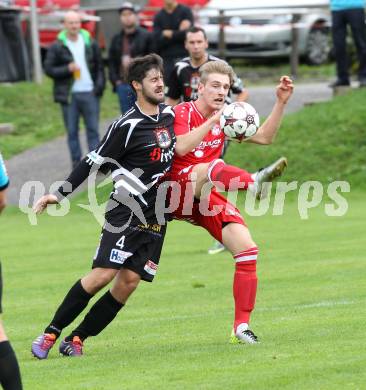 Fussball. Unterliga Ost. Ludmannsdorf gegen Kraig. Michael Krainer (Ludmannsdorf), Christian Groinig (Kraig).
Ludmannsdorf, 14.9.2014.
Foto: Kuess
---
pressefotos, pressefotografie, kuess, qs, qspictures, sport, bild, bilder, bilddatenbank