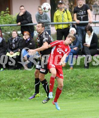 Fussball. Unterliga Ost. Ludmannsdorf gegen Kraig. Markus Partl (Ludmannsdorf), Christoph Maximilian Fruehstueck (Kraig).
Ludmannsdorf, 14.9.2014.
Foto: Kuess
---
pressefotos, pressefotografie, kuess, qs, qspictures, sport, bild, bilder, bilddatenbank