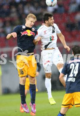 Fussball Bundesliga. RZ Pellets WAC gegen FC Red Bull Salzburg. Roland Putsche, (WAC), Martin Hinteregger  (Salzburg). Klagenfurt, am 14.9.2014.
Foto: Kuess

---
pressefotos, pressefotografie, kuess, qs, qspictures, sport, bild, bilder, bilddatenbank