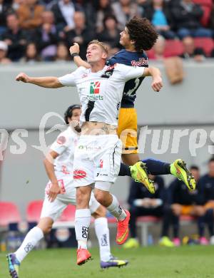 Fussball Bundesliga. RZ Pellets WAC gegen FC Red Bull Salzburg. Tadej Trdina, (WAC), Andre Ramalho Silva  (Salzburg). Klagenfurt, am 14.9.2014.
Foto: Kuess

---
pressefotos, pressefotografie, kuess, qs, qspictures, sport, bild, bilder, bilddatenbank