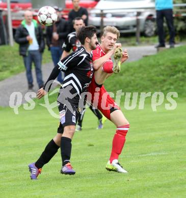 Fussball. Unterliga Ost. Ludmannsdorf gegen Kraig. Michael Krainer (Ludmannsdorf), Christian Groinig (Kraig).
Ludmannsdorf, 14.9.2014.
Foto: Kuess
---
pressefotos, pressefotografie, kuess, qs, qspictures, sport, bild, bilder, bilddatenbank