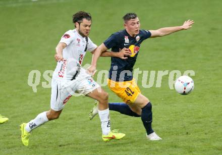 Fussball Bundesliga. RZ Pellets WAC gegen FC Red Bull Salzburg. Nemanja Rnic, (WAC), Nils Quaschner (Salzburg). Klagenfurt, am 14.9.2014.
Foto: Kuess

---
pressefotos, pressefotografie, kuess, qs, qspictures, sport, bild, bilder, bilddatenbank