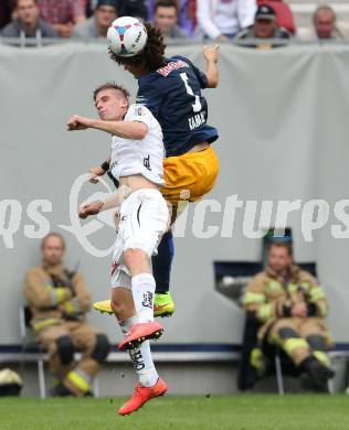 Fussball Bundesliga. RZ Pellets WAC gegen FC Red Bull Salzburg. Tadej Trdina, (WAC), Andre Ramalho Silva  (Salzburg). Klagenfurt, am 14.9.2014.
Foto: Kuess

---
pressefotos, pressefotografie, kuess, qs, qspictures, sport, bild, bilder, bilddatenbank