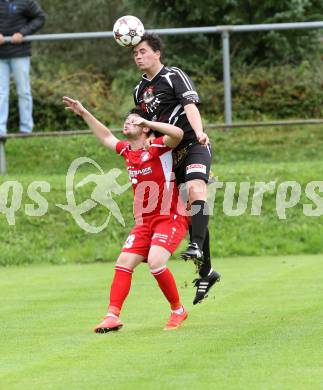 Fussball. Unterliga Ost. Ludmannsdorf gegen Kraig. Andreas Schawarz (Ludmannsdorf), Rene Hohlmann (Kraig).
Ludmannsdorf, 14.9.2014.
Foto: Kuess
---
pressefotos, pressefotografie, kuess, qs, qspictures, sport, bild, bilder, bilddatenbank