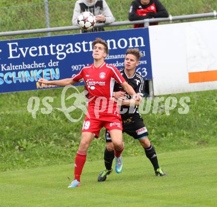 Fussball. Unterliga Ost. Ludmannsdorf gegen Kraig. Markus Partl (Ludmannsdorf), Dominik Apolloner (Kraig).
Ludmannsdorf, 14.9.2014.
Foto: Kuess
---
pressefotos, pressefotografie, kuess, qs, qspictures, sport, bild, bilder, bilddatenbank