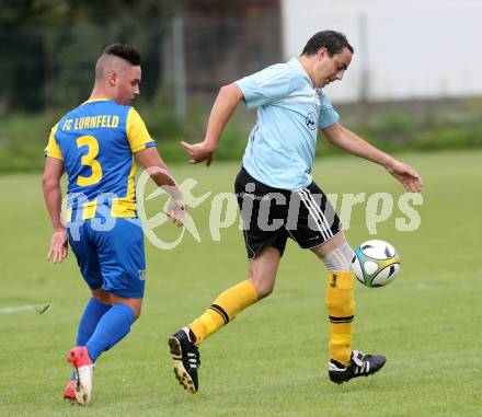 Fussball. 2. Klasse A. Lurnfeld gegen Gitschtal. Jakob Alexander Unterkofler,  (Lurnfeld), Christian Jost (Gitschtal). Moellbruecke, 13.9.2014.
Foto: Kuess
---
pressefotos, pressefotografie, kuess, qs, qspictures, sport, bild, bilder, bilddatenbank