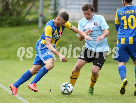 Fussball. 2. Klasse A. Lurnfeld gegen Gitschtal. Benjamin Friedrich Josef Maier,  (Lurnfeld), Hansjoerg Santner (Gitschtal). Moellbruecke, 13.9.2014.
Foto: Kuess
---
pressefotos, pressefotografie, kuess, qs, qspictures, sport, bild, bilder, bilddatenbank