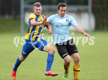 Fussball. 2. Klasse A. Lurnfeld gegen Gitschtal. Benjamin Friedrich Josef Maier,  (Lurnfeld), Hansjoerg Santner (Gitschtal). Moellbruecke, 13.9.2014.
Foto: Kuess
---
pressefotos, pressefotografie, kuess, qs, qspictures, sport, bild, bilder, bilddatenbank