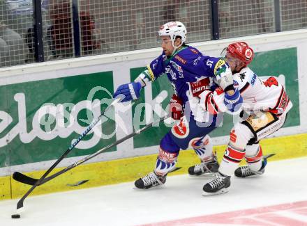 EBEL. Eishockey Bundesliga. EC VSV gegen HC TWK Innsbruck. Eric Hunter,  (VSV), Florian Stern (Innsbruck). Villach, am 19.9.2014.
Foto: Kuess 


---
pressefotos, pressefotografie, kuess, qs, qspictures, sport, bild, bilder, bilddatenbank