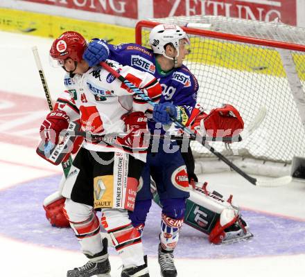 EBEL. Eishockey Bundesliga. EC VSV gegen HC TWK Innsbruck. Patrick Platzer,  (VSV), Mario Ebner (Innsbruck). Villach, am 19.9.2014.
Foto: Kuess 


---
pressefotos, pressefotografie, kuess, qs, qspictures, sport, bild, bilder, bilddatenbank