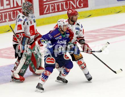 EBEL. Eishockey Bundesliga. EC VSV gegen HC TWK Innsbruck. Marco Pewal,  (VSV), Florian Pedevilla (Innsbruck). Villach, am 19.9.2014.
Foto: Kuess 


---
pressefotos, pressefotografie, kuess, qs, qspictures, sport, bild, bilder, bilddatenbank