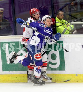 EBEL. Eishockey Bundesliga. EC VSV gegen HC TWK Innsbruck.  Ruslan Gelfanov, (VSV), Nicholas Ross  (Innsbruck). Villach, am 19.9.2014.
Foto: Kuess 


---
pressefotos, pressefotografie, kuess, qs, qspictures, sport, bild, bilder, bilddatenbank