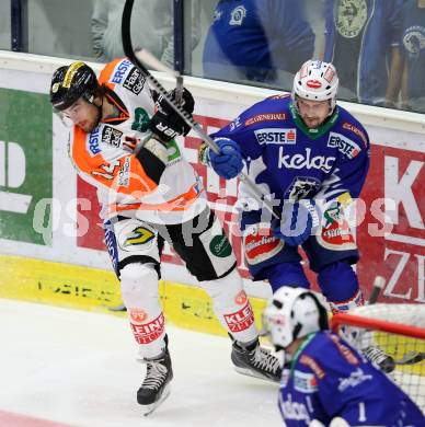 EBEL. Eishockey Bundesliga. EC VSV gegen Moser Medical Graz 99ers.  Klemen Pretnar,  (VSV), Luke Walker (Graz). Villach, am 19.9.2014.
Foto: Kuess 


---
pressefotos, pressefotografie, kuess, qs, qspictures, sport, bild, bilder, bilddatenbank